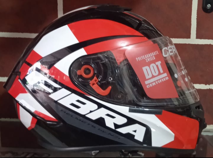 Casco Integral Fibra Naranja vista lateral