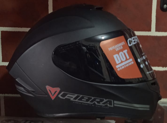 Casco Integral Fibra Naranja vista lateral